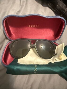 Gucci Men’s Black Aviator Sunglasses with Dark Lenses